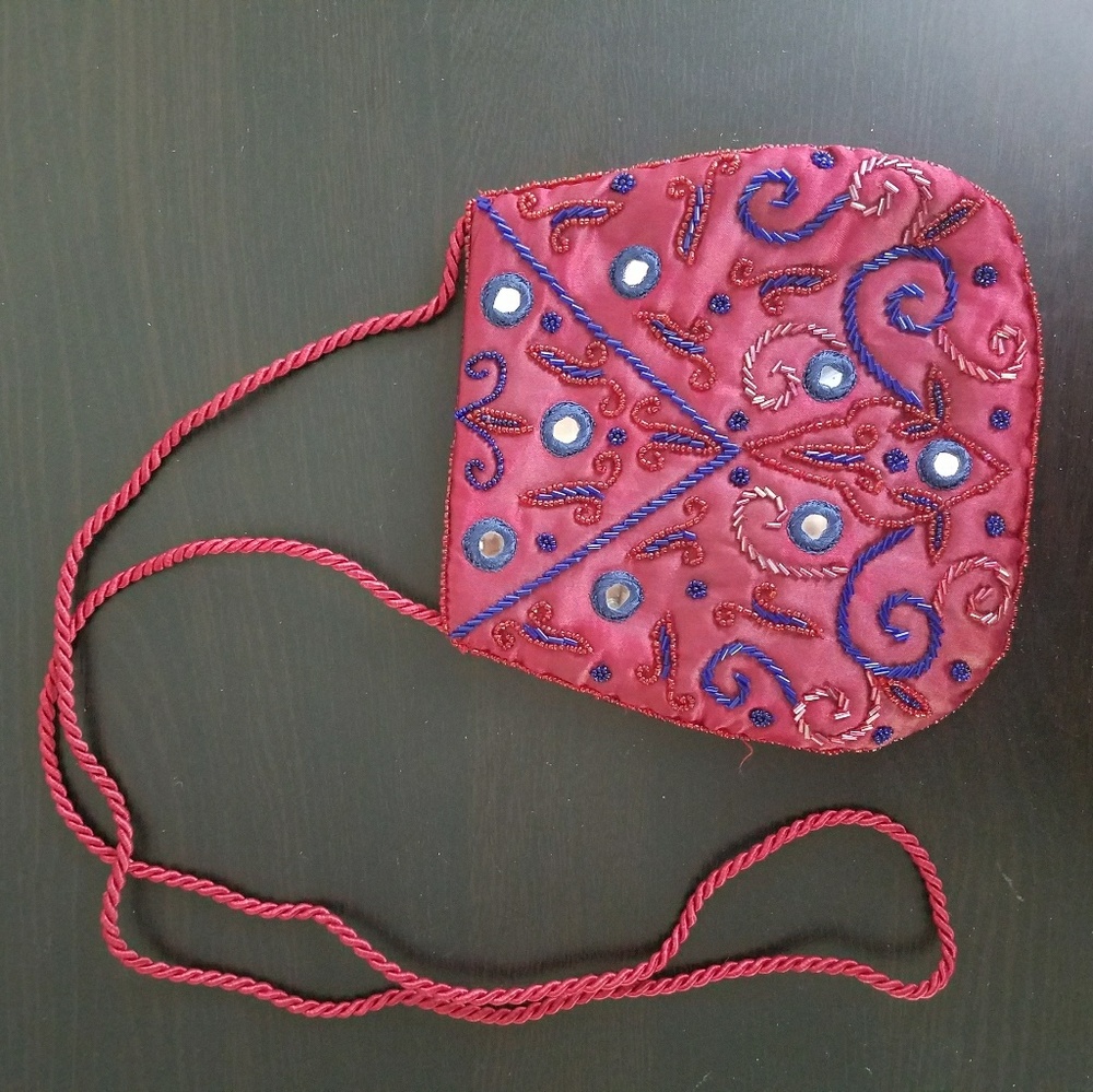 Red embroidered & mirror work crossbody bag